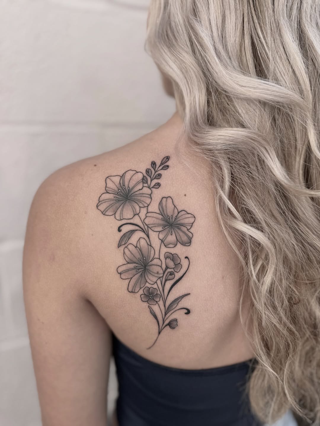 28 Larkspur Tattoo Ideas: Delicate July Blooms with Big Meaning