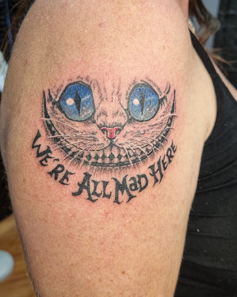 29 Cheshire Cat Tattoo Ideas: From Whimsical Grins to Dark Wonderland Symbolism