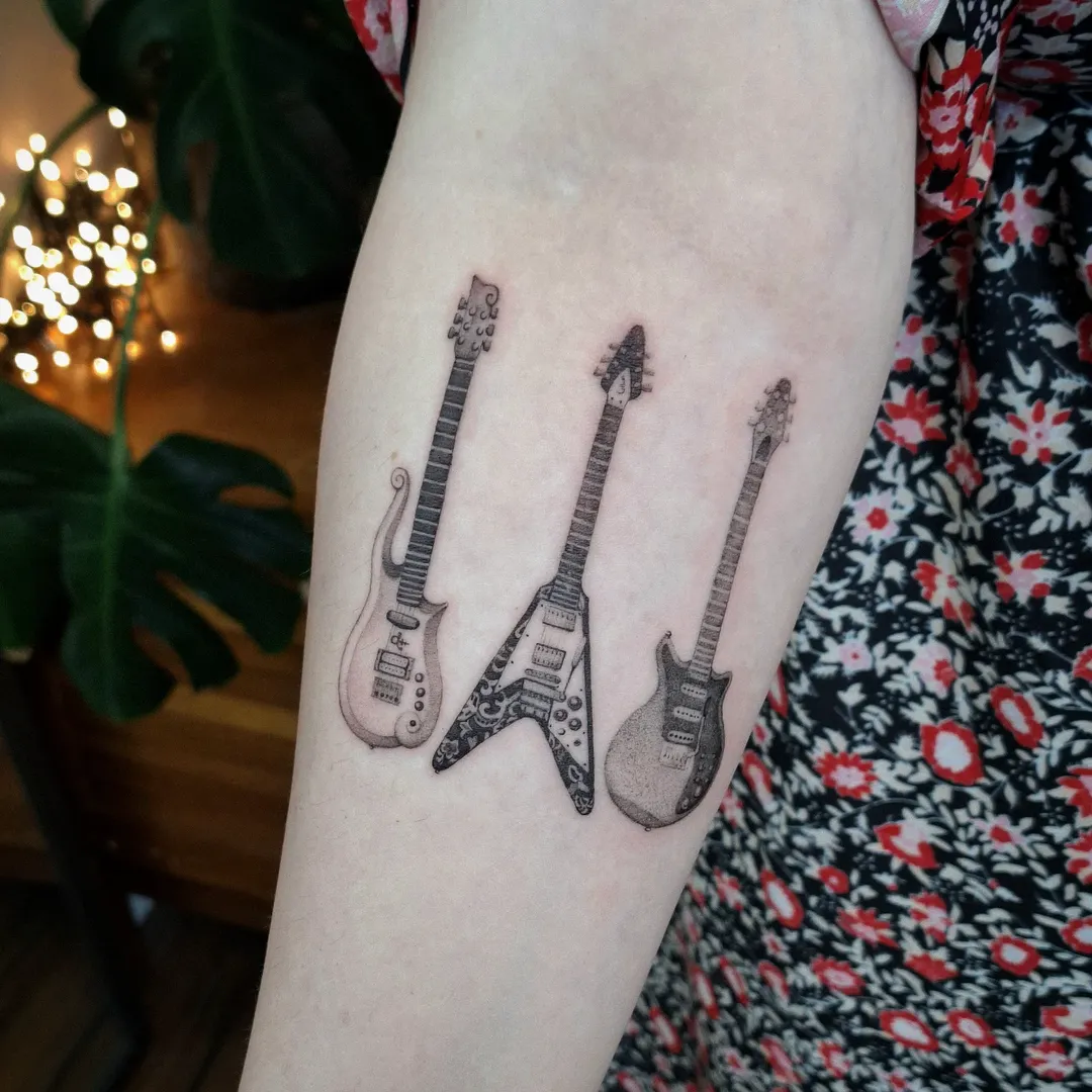 31 Guitar Tattoo Ideas for Music Lovers: From Minimalist Designs to Bold Sleeve Art