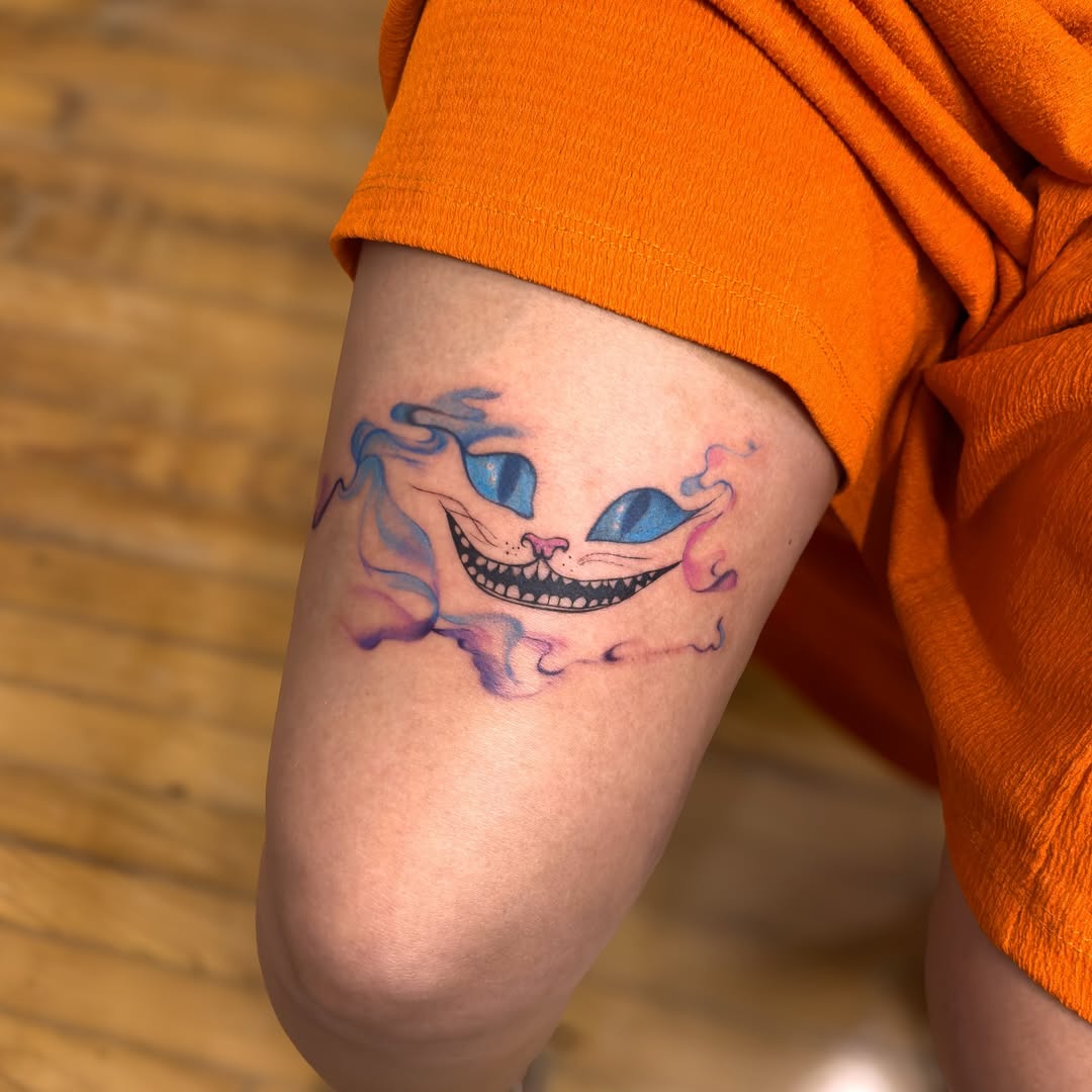 29 Cheshire Cat Tattoo Ideas: From Whimsical Grins to Dark Wonderland Symbolism
