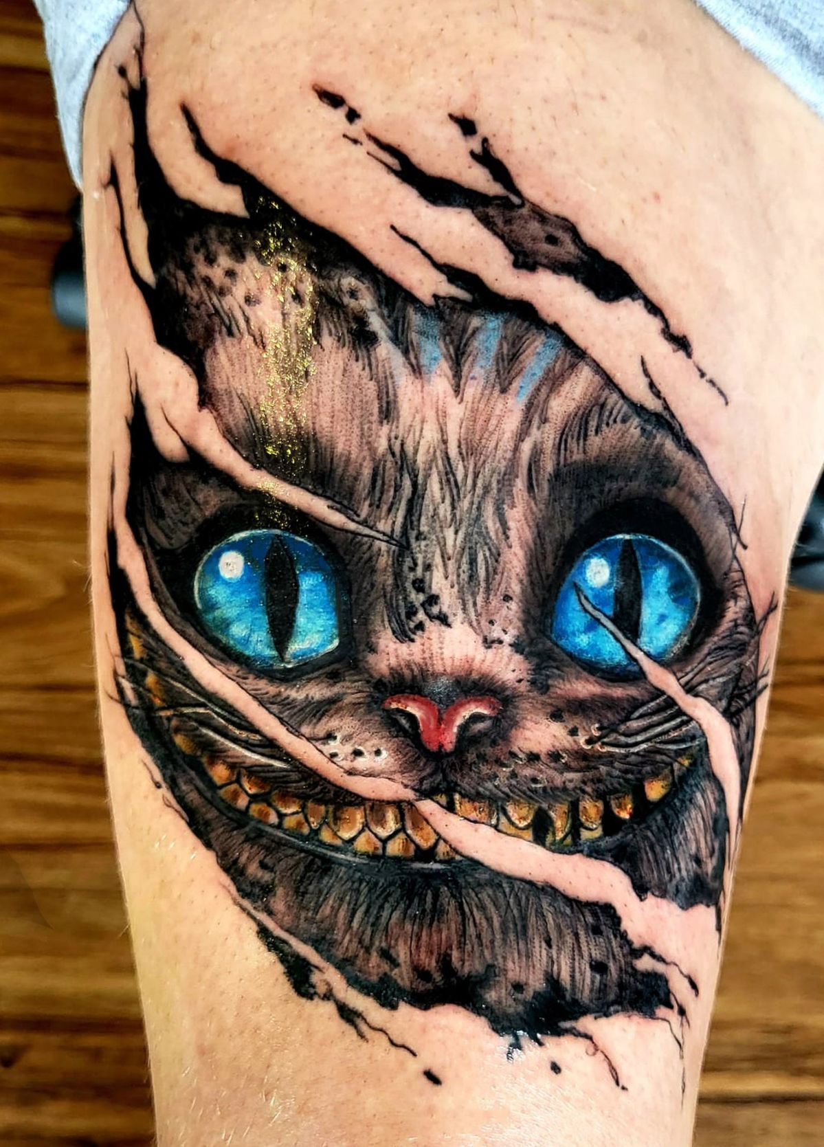 29 Cheshire Cat Tattoo Ideas: From Whimsical Grins to Dark Wonderland Symbolism