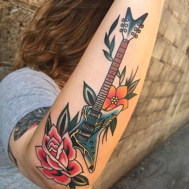 31 Guitar Tattoo Ideas for Music Lovers: From Minimalist Designs to Bold Sleeve Art