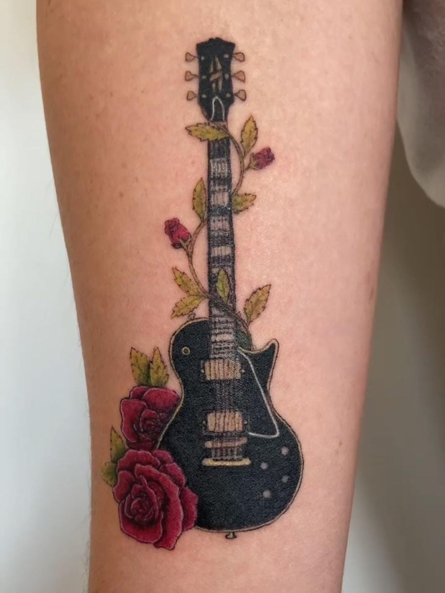 31 Guitar Tattoo Ideas for Music Lovers: From Minimalist Designs to Bold Sleeve Art