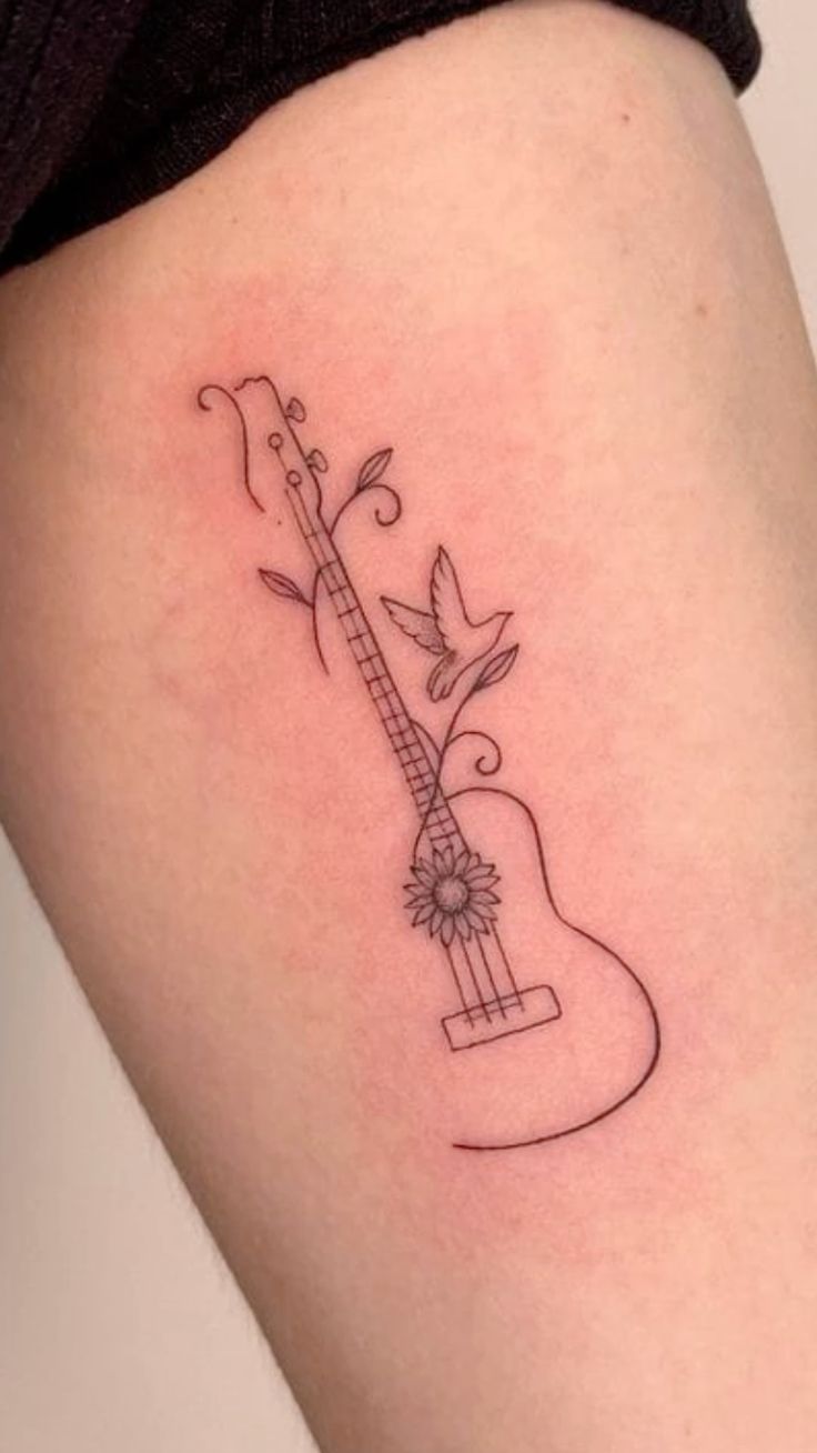 31 Guitar Tattoo Ideas for Music Lovers: From Minimalist Designs to Bold Sleeve Art