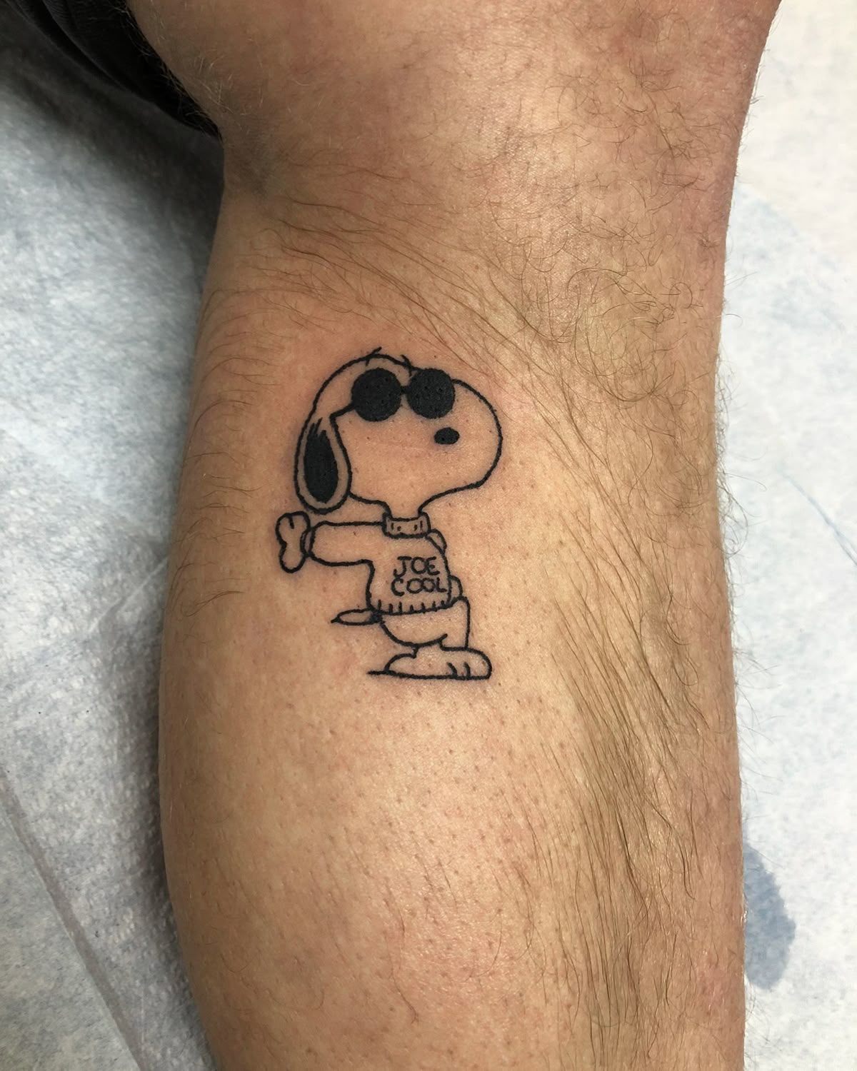 29 Snoopy Tattoo Ideas: Tiny Fine-Line, Joe Cool & Classic Designs for Women and Men