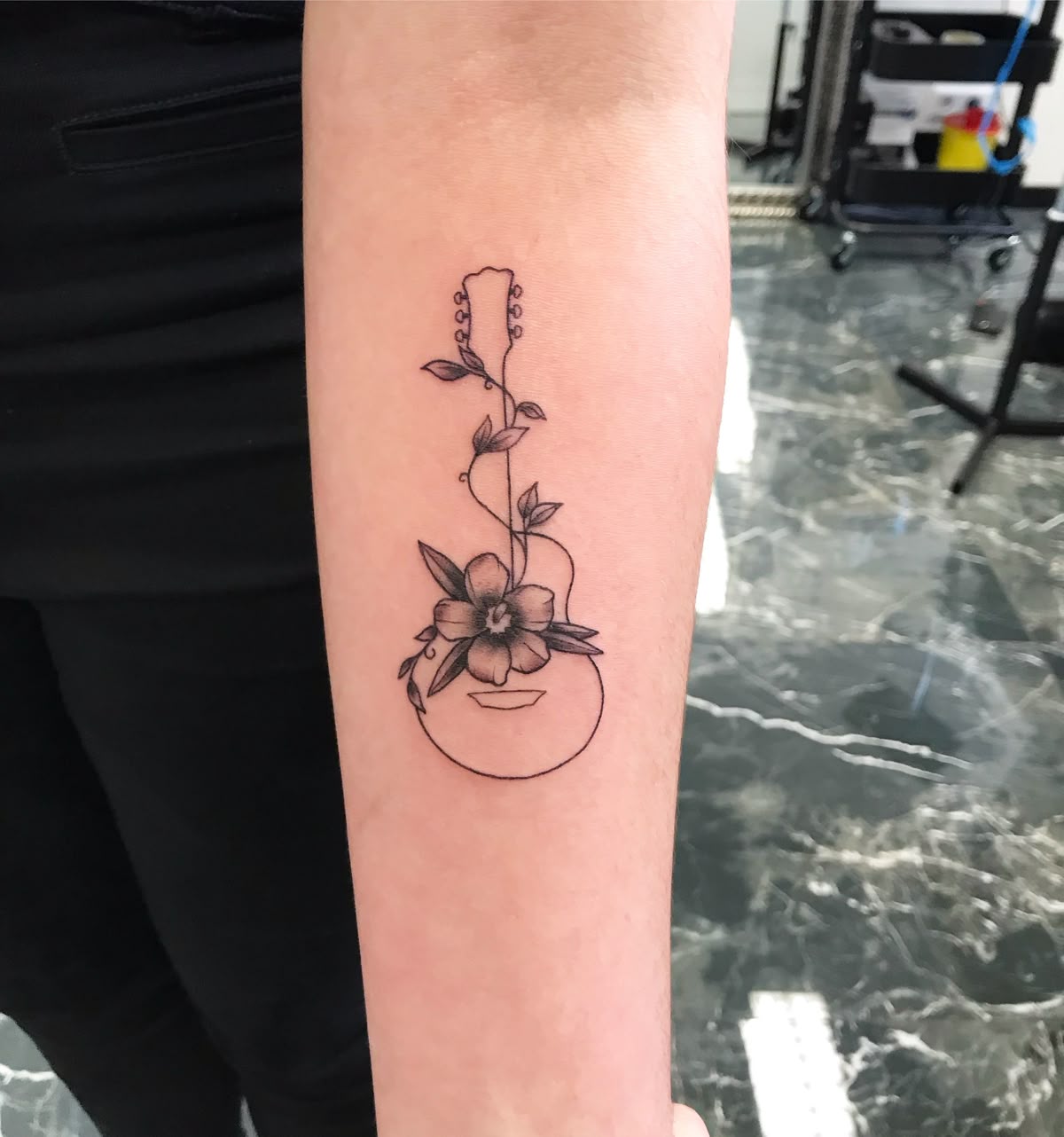 31 Guitar Tattoo Ideas for Music Lovers: From Minimalist Designs to Bold Sleeve Art