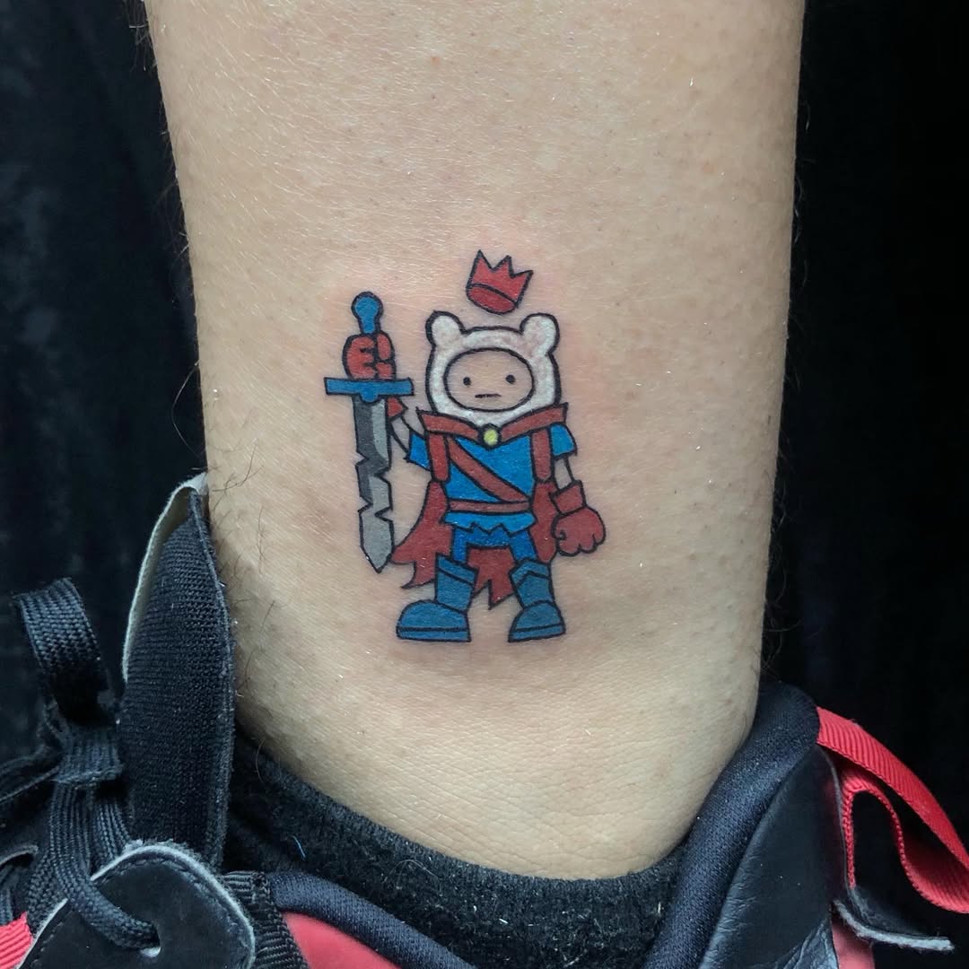 29 Adventure Time Tattoo Designs: Flash Sheet Picks, Minimalist Ideas, and Bold Character Pieces