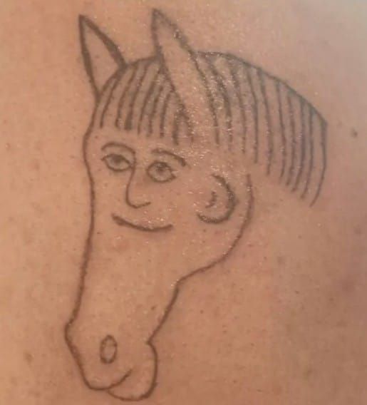 28 Bad Tattoos: When Good Intentions Meet Terrible Ink Decisions