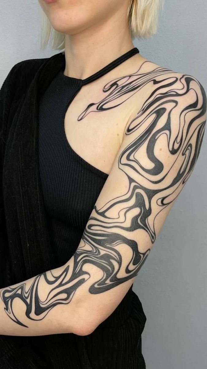 28 Abstract Tattoo Ideas: Fluid Lines, Meaningful Shapes, and Modern Expression
