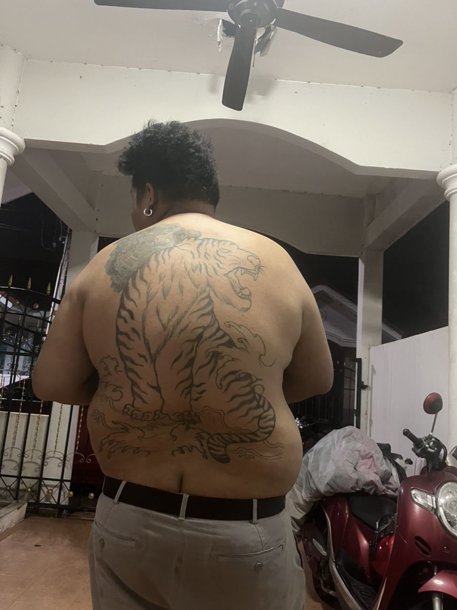 28 Bad Tattoos: When Good Intentions Meet Terrible Ink Decisions