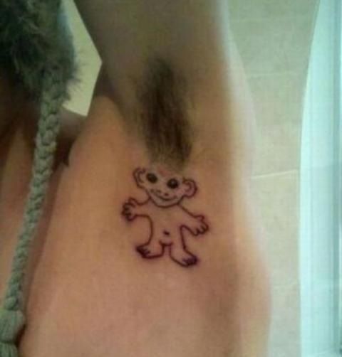 28 Bad Tattoos: When Good Intentions Meet Terrible Ink Decisions