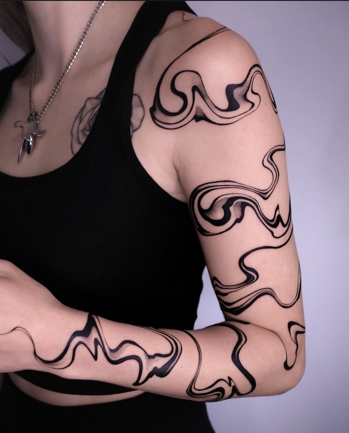 28 Abstract Tattoo Ideas: Fluid Lines, Meaningful Shapes, and Modern Expression