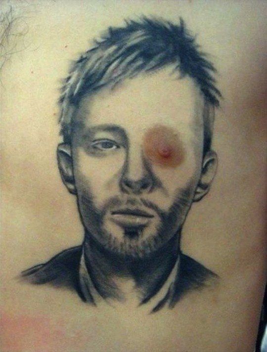 28 Bad Tattoos: When Good Intentions Meet Terrible Ink Decisions