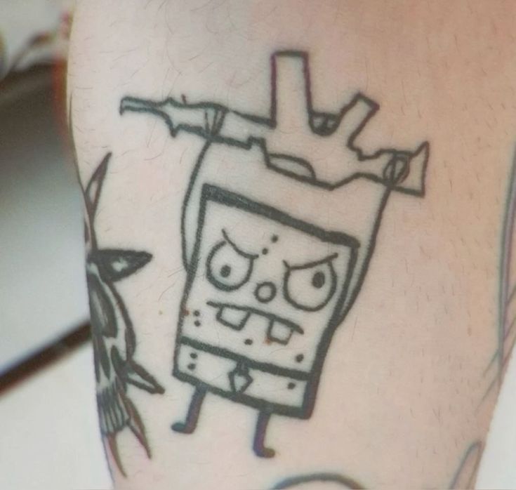 28 Bad Tattoos: When Good Intentions Meet Terrible Ink Decisions