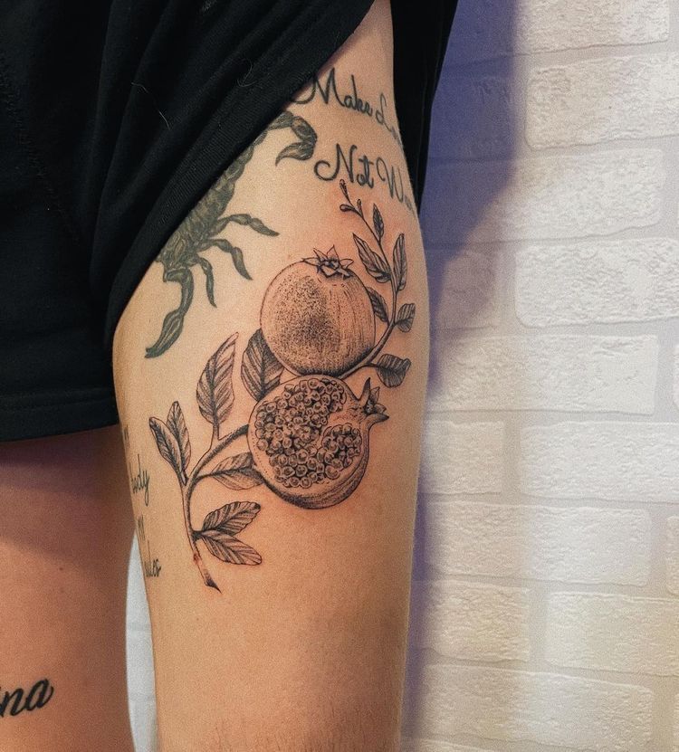 30 Pomegranate Tattoo Ideas: From Ancient Symbolism to Modern Ink