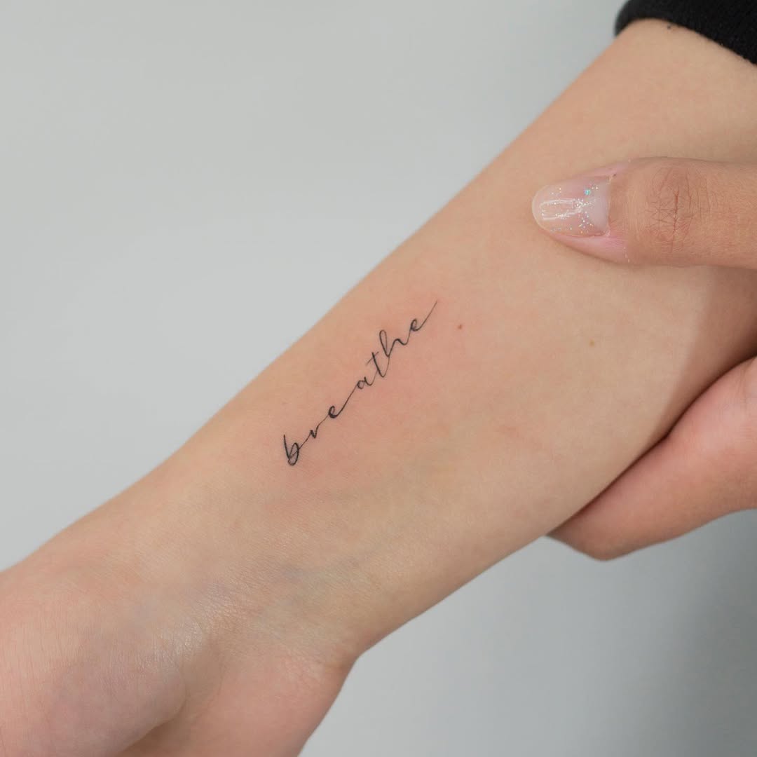29 Breathe Tattoo Ideas: Simple Script, Fine Line, Floral, Lotus & Symbol Designs