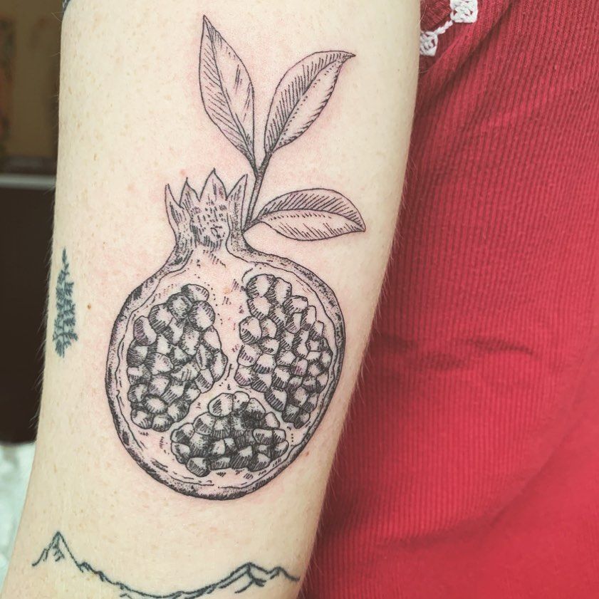 30 Pomegranate Tattoo Ideas: From Ancient Symbolism to Modern Ink
