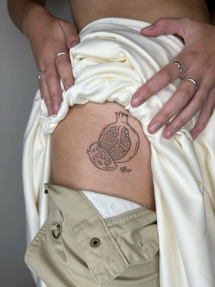 30 Pomegranate Tattoo Ideas: From Ancient Symbolism to Modern Ink