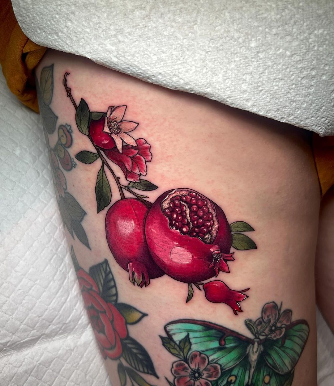 30 Pomegranate Tattoo Ideas: From Ancient Symbolism to Modern Ink