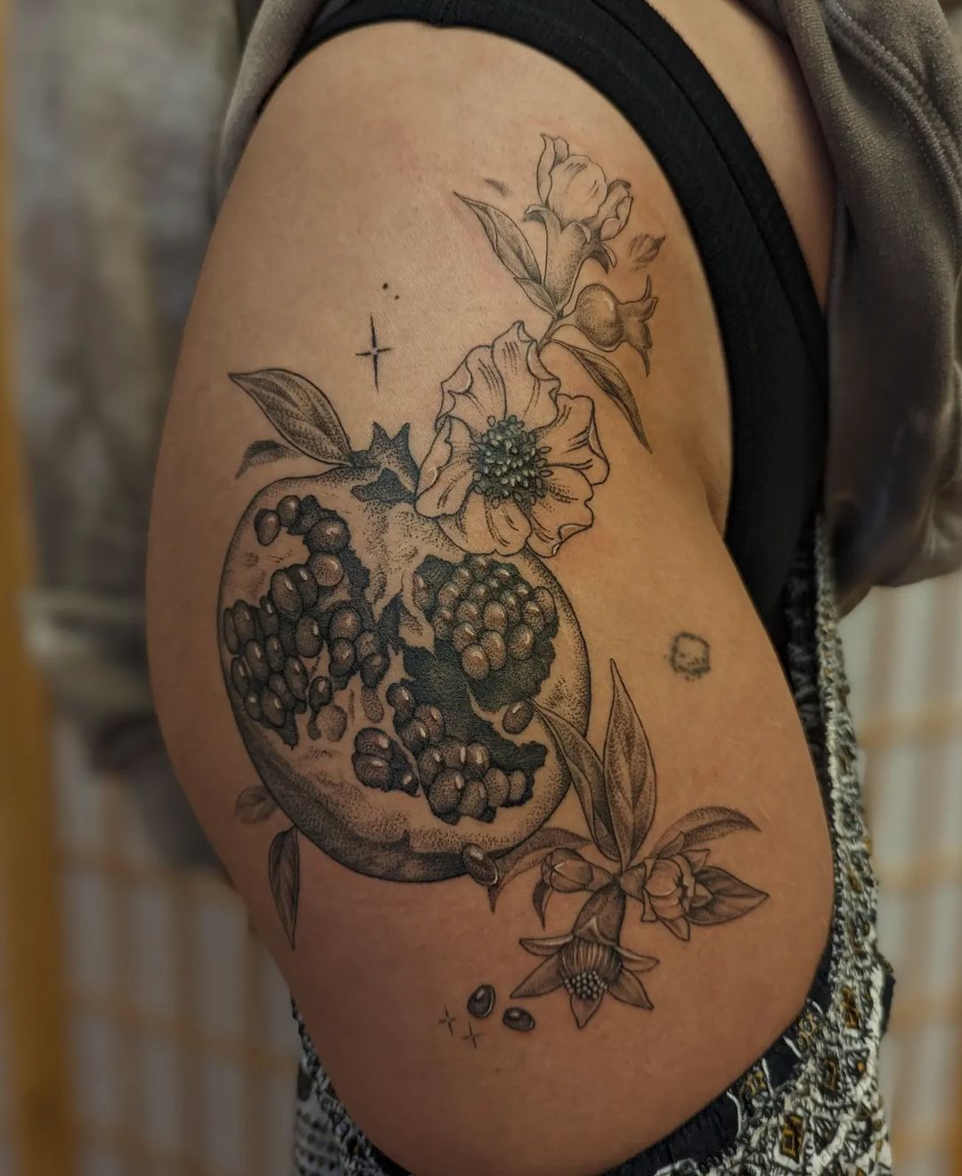 30 Pomegranate Tattoo Ideas: From Ancient Symbolism to Modern Ink