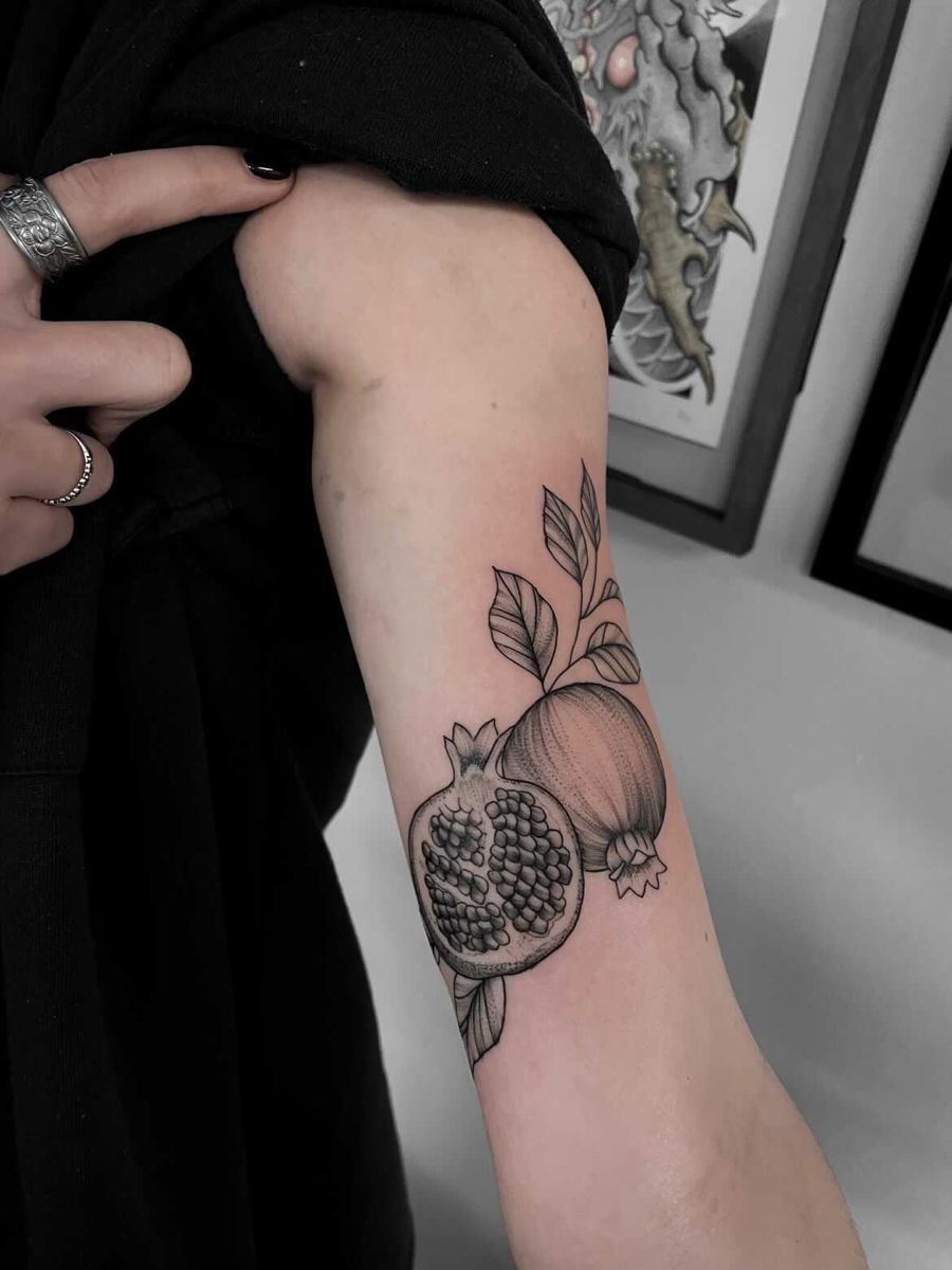 30 Pomegranate Tattoo Ideas: From Ancient Symbolism to Modern Ink