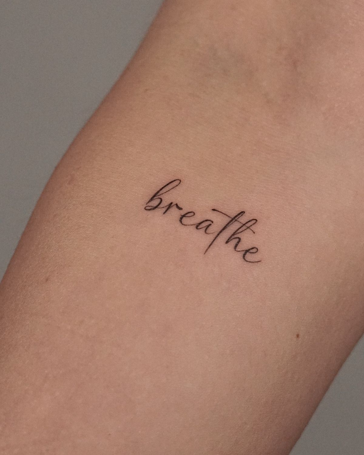 29 Breathe Tattoo Ideas: Simple Script, Fine Line, Floral, Lotus & Symbol Designs