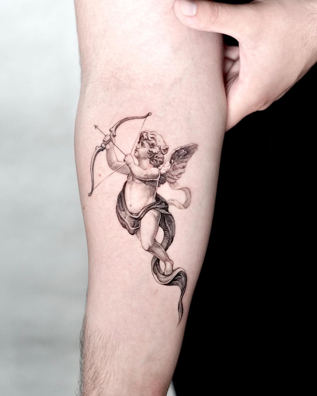28 Cupid Tattoo Ideas: Timeless Romance, Modern Ink