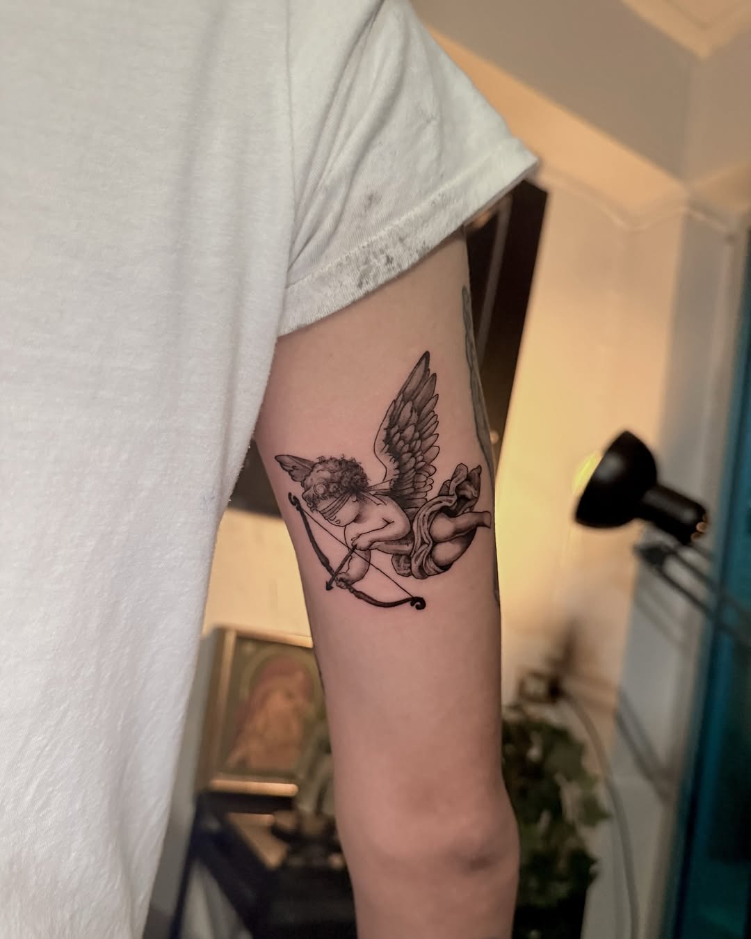 28 Cupid Tattoo Ideas: Timeless Romance, Modern Ink