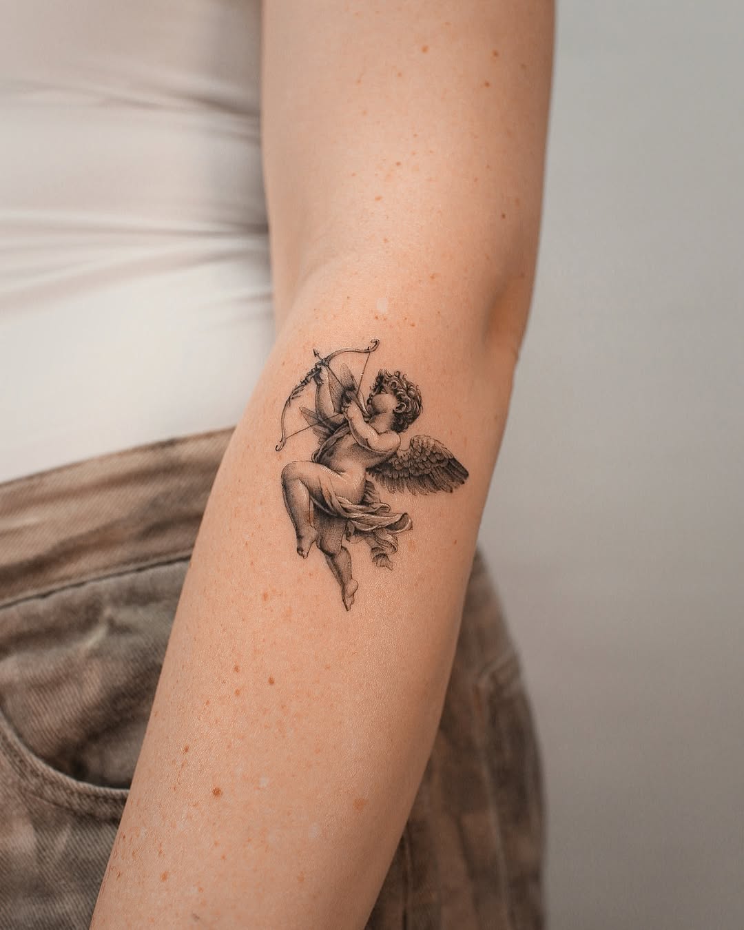 28 Cupid Tattoo Ideas: Timeless Romance, Modern Ink