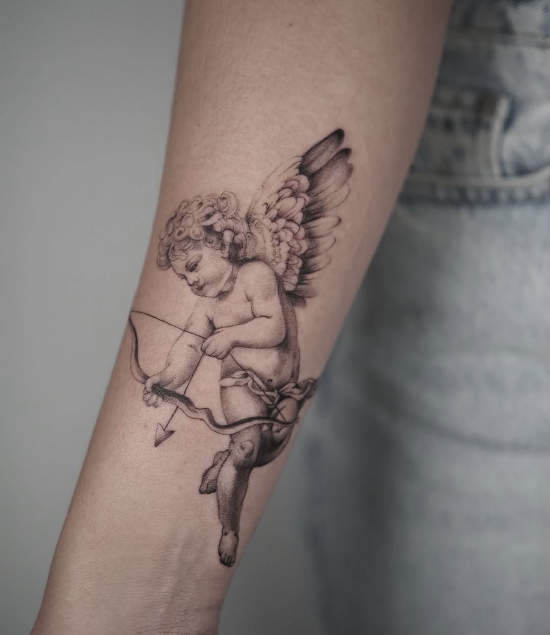 28 Cupid Tattoo Ideas: Timeless Romance, Modern Ink