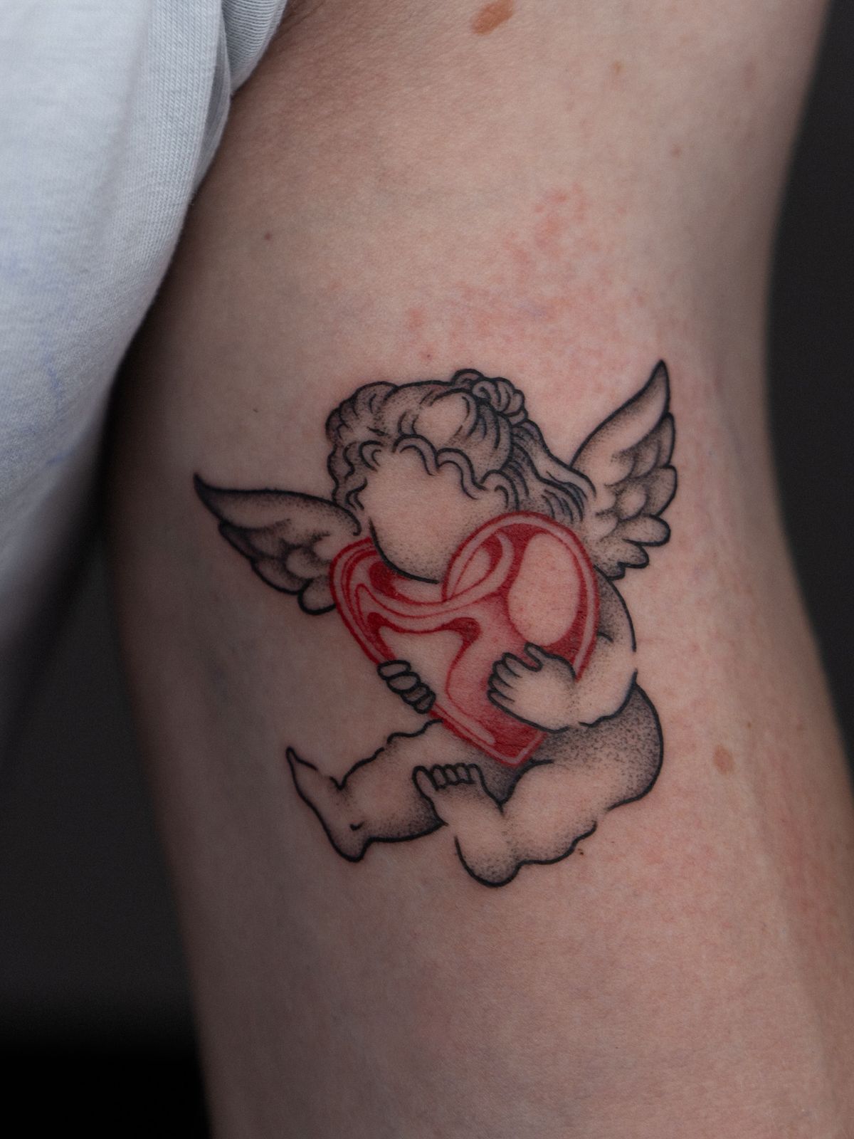 28 Cupid Tattoo Ideas: Timeless Romance, Modern Ink