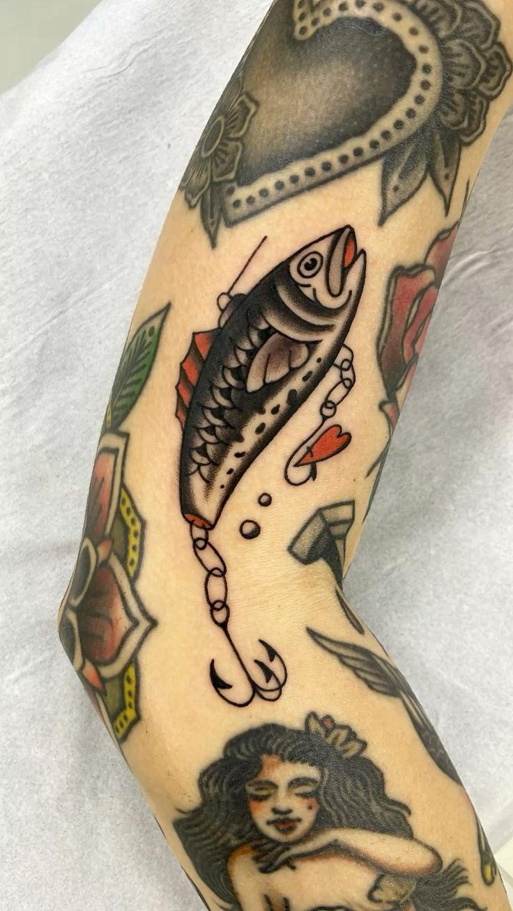 29 Fishing Tattoo Ideas: From Fine Line Minimalism to Bold Traditional Sleeves