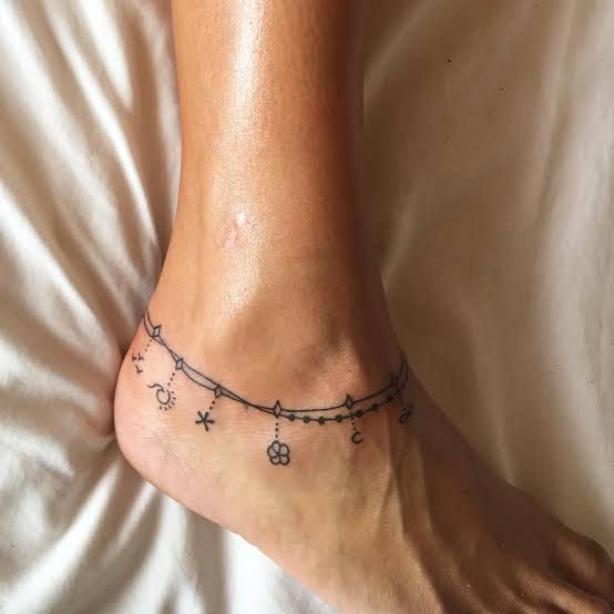 30 Anklet Tattoo Ideas 2026: Stylish Wrap Around, Chain & Fine Line Designs For Women