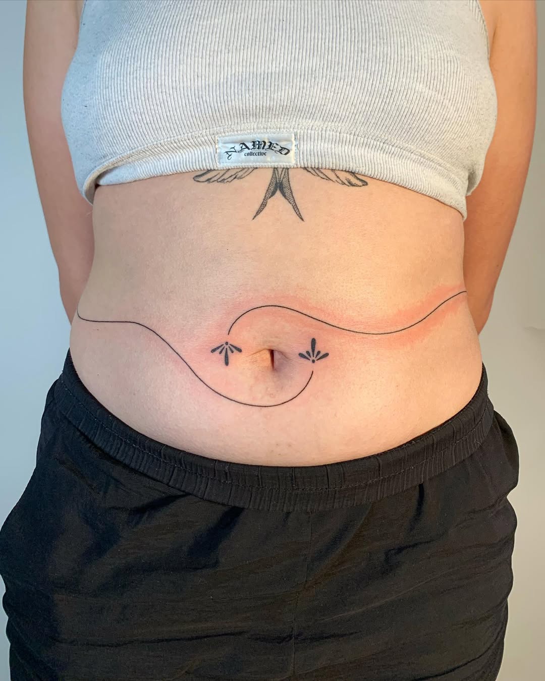 28 Belly Button Tattoo Ideas 2026: Feminine, Dainty & Bold Designs for Women