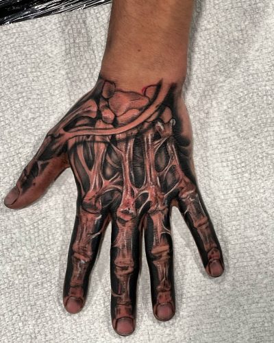 Skeleton Hand Tattoo Ideas 2026 for Men and Women with Roses, Clocks ...