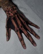 Skeleton Hand Tattoo Ideas 2026 for Men and Women with Roses, Clocks ...