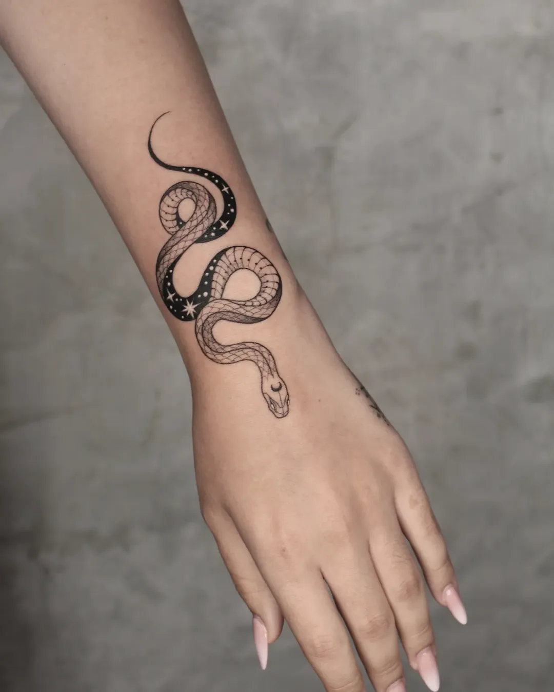 31 Snake Tattoo Ideas 2026: Meaningful Designs for Men and Women on Arm, Back, Spine, and Leg