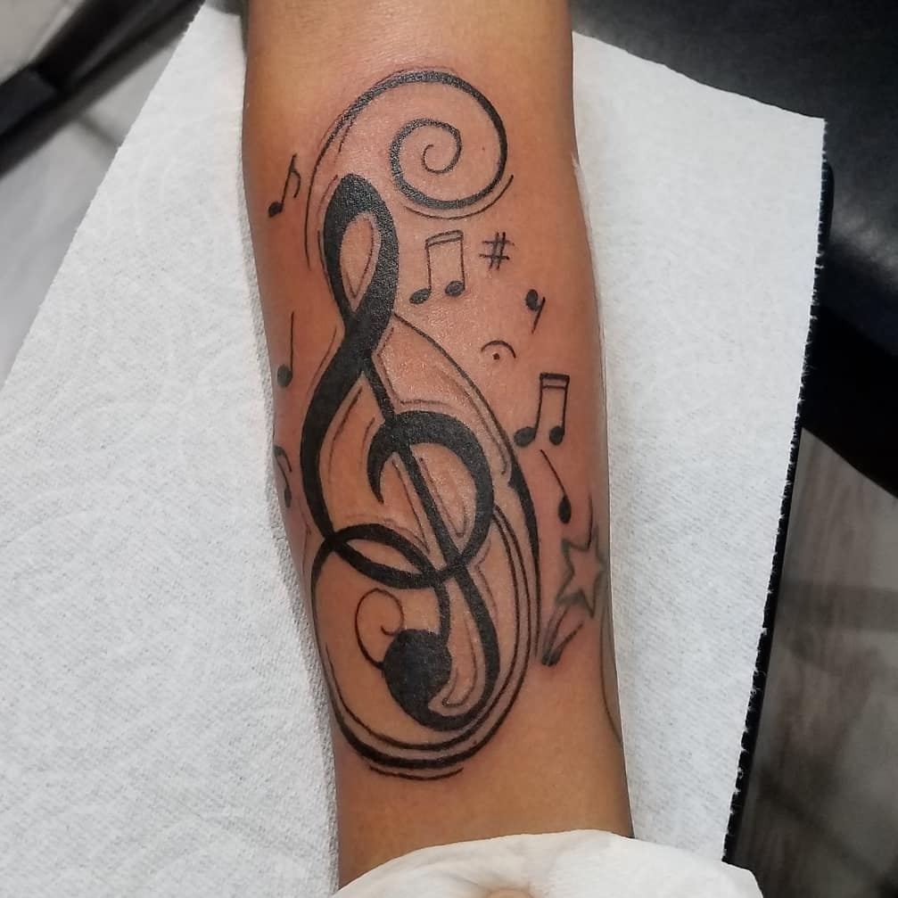 30 Music Notes Tattoo Ideas 2026: Tiny, Simple & Meaningful Designs for Every Style