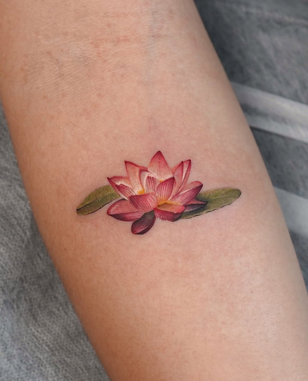 28 Water Lily Tattoo Ideas 2026: Beautiful Fine Line, Color and Japanese Designs