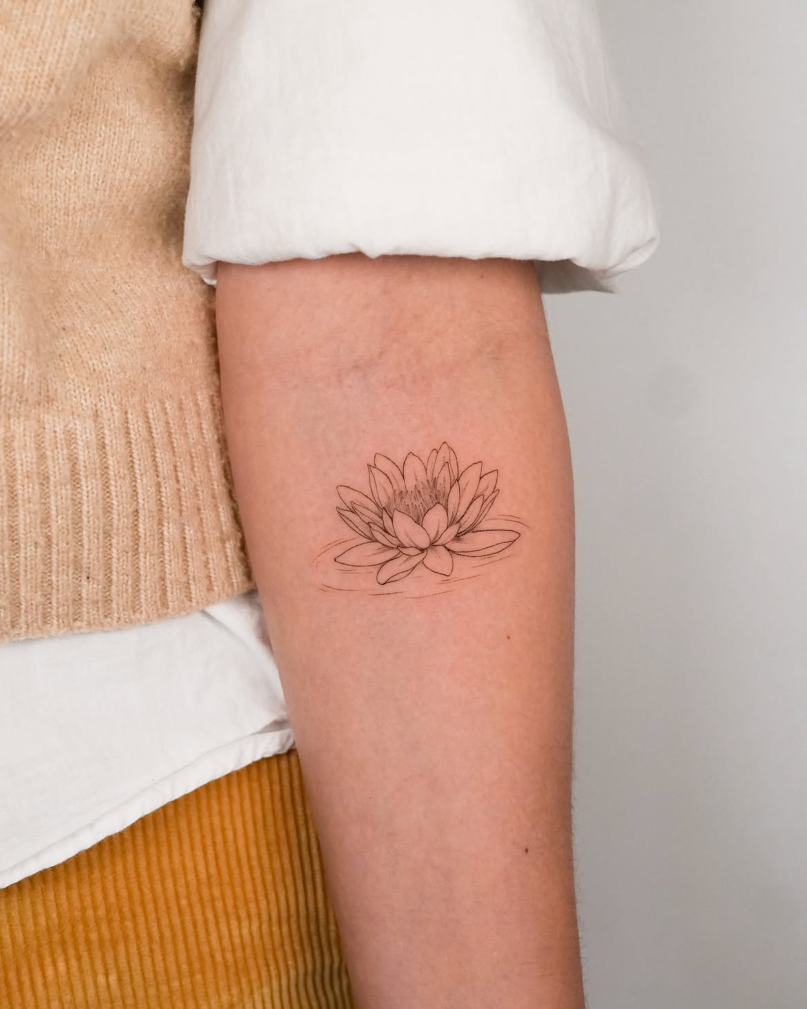 28 Water Lily Tattoo Ideas 2026: Beautiful Fine Line, Color and Japanese Designs