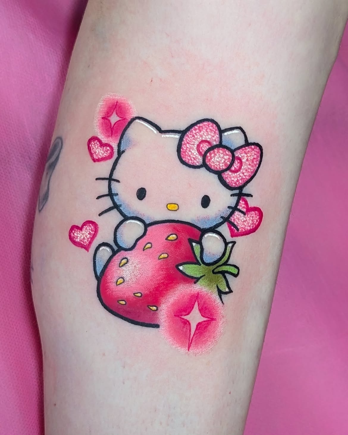 29 Hello Kitty Tattoo Ideas: Cute, Minimalist, Pink and Playful Designs