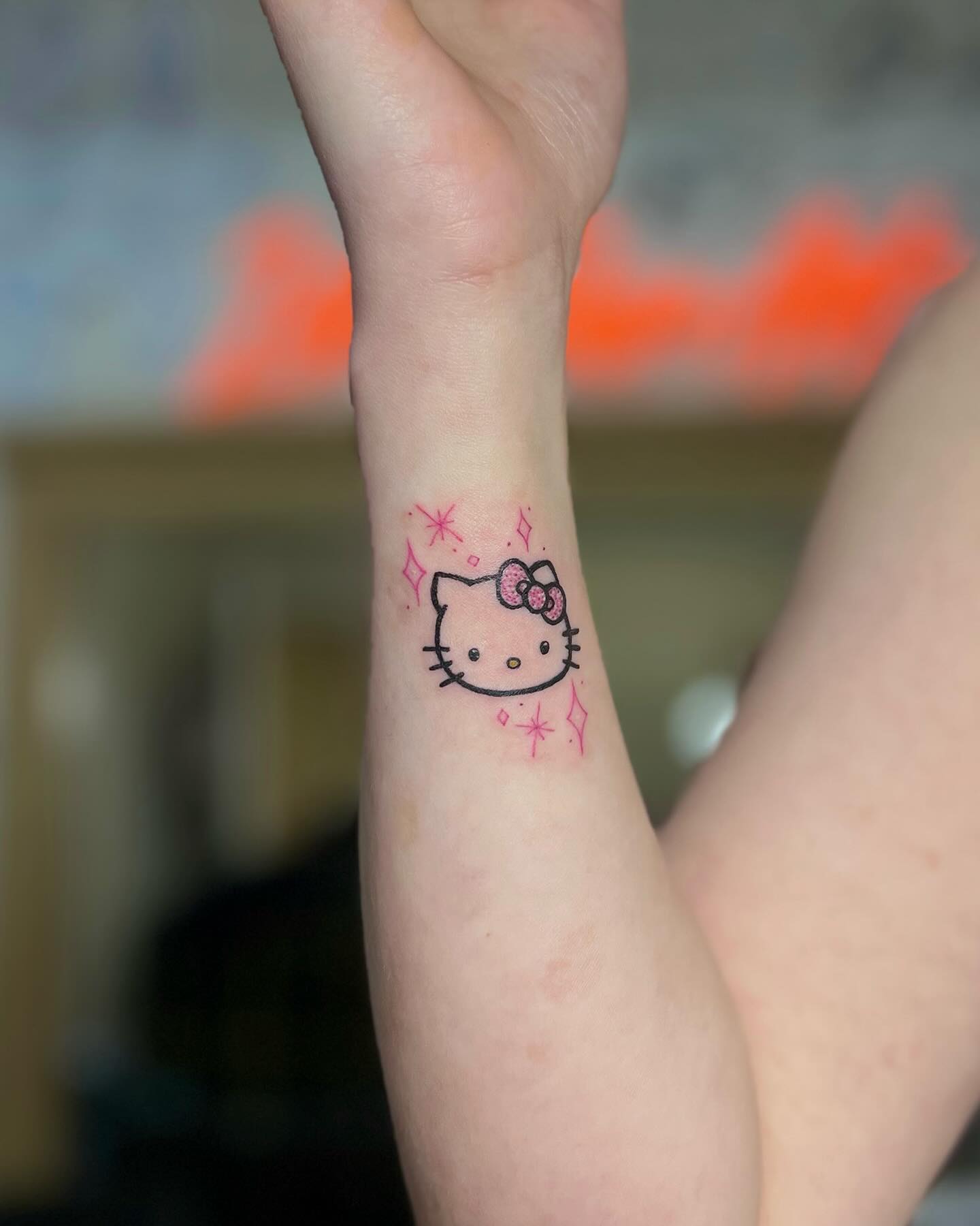 29 Hello Kitty Tattoo Ideas: Cute, Minimalist, Pink and Playful Designs