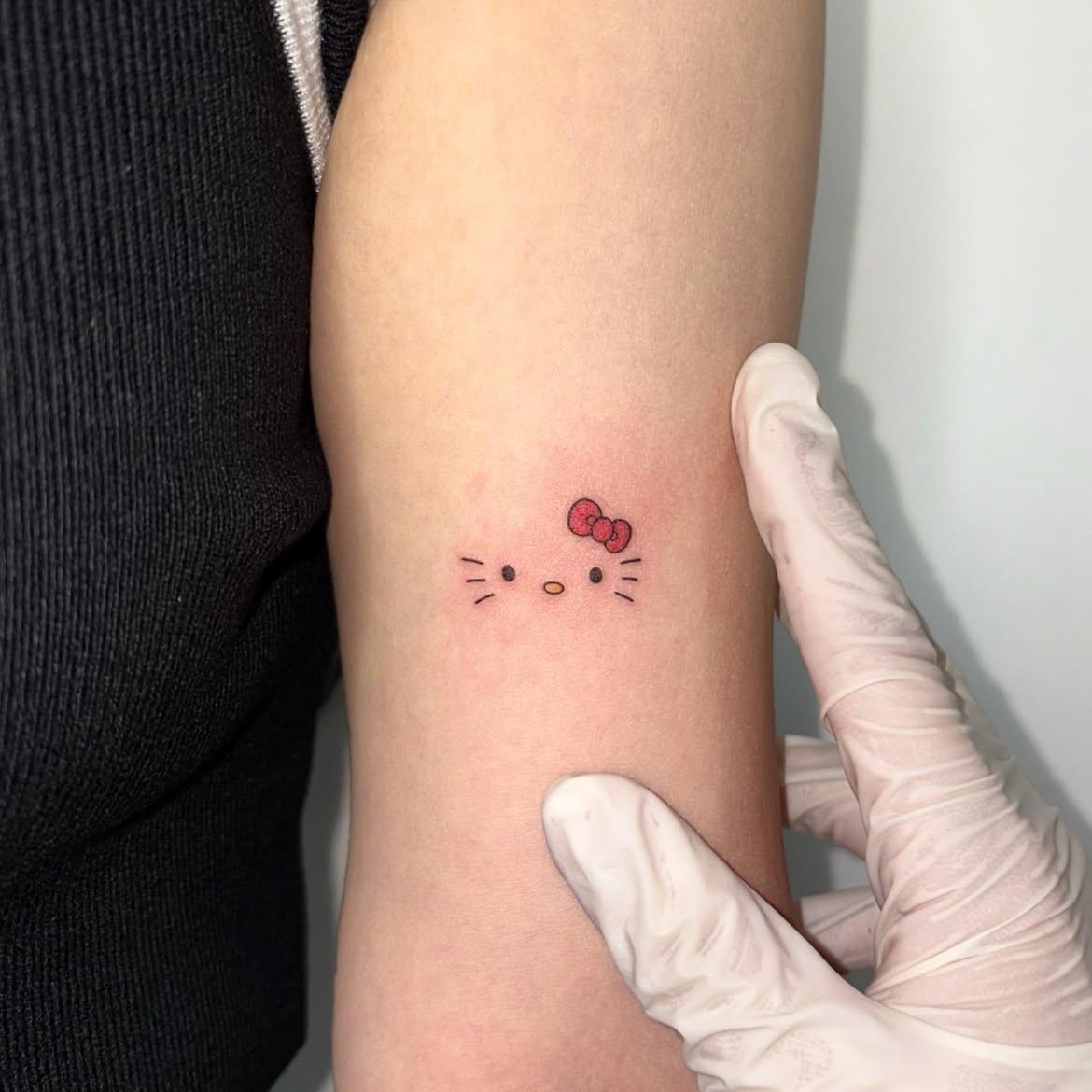 29 Hello Kitty Tattoo Ideas: Cute, Minimalist, Pink and Playful Designs