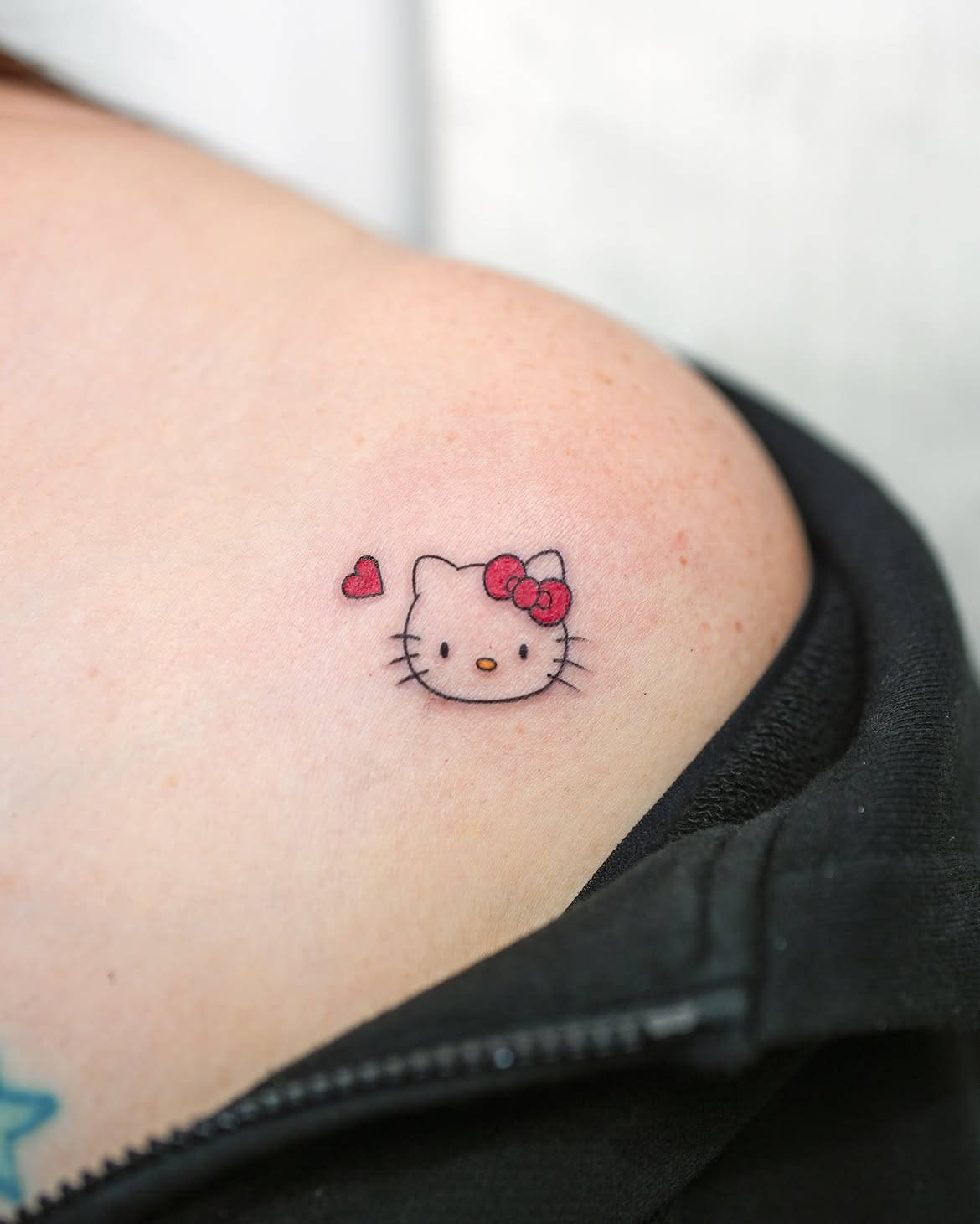29 Hello Kitty Tattoo Ideas: Cute, Minimalist, Pink and Playful Designs