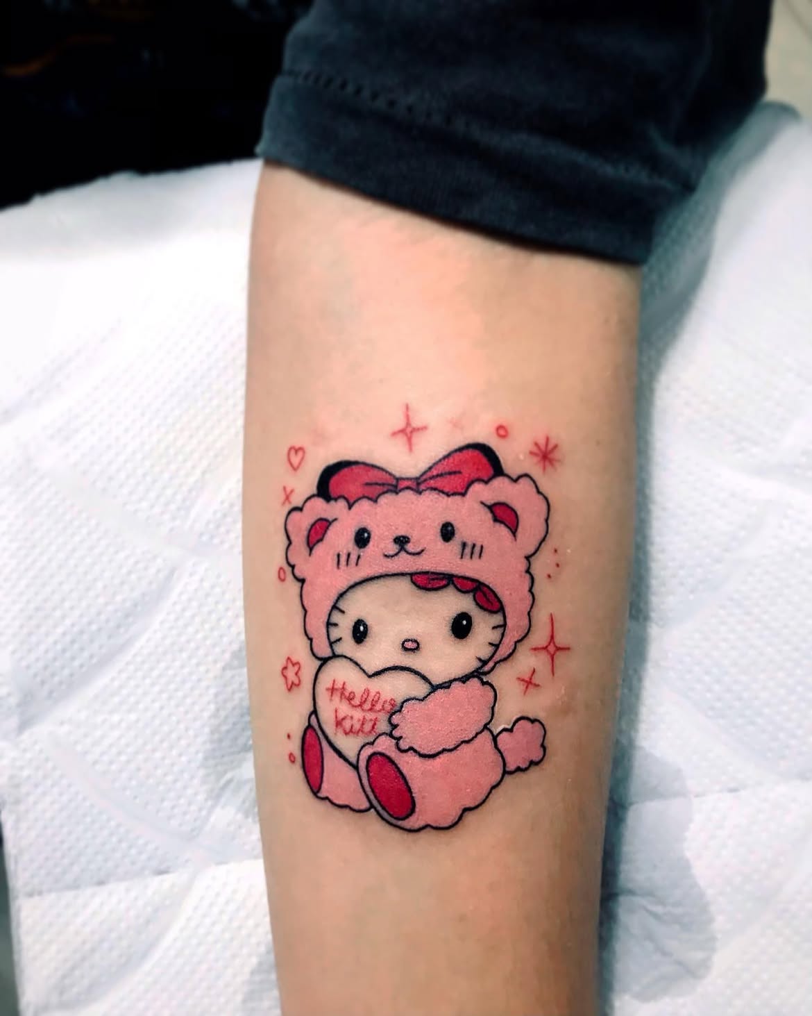 29 Hello Kitty Tattoo Ideas: Cute, Minimalist, Pink and Playful Designs