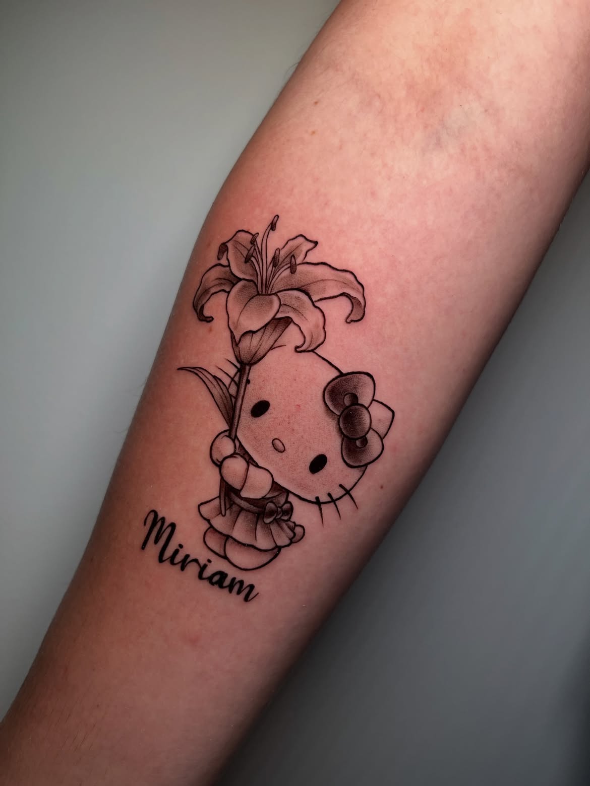 29 Hello Kitty Tattoo Ideas: Cute, Minimalist, Pink and Playful Designs