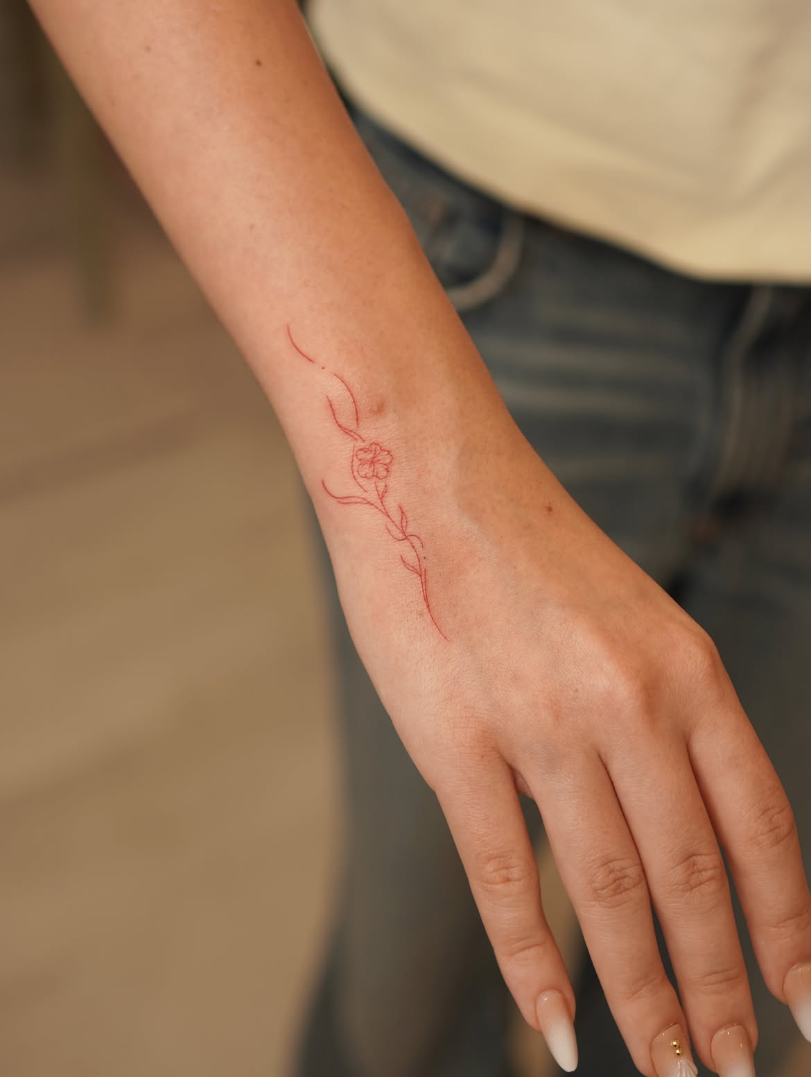 28 Red Ink Tattoo Ideas 2026: Fine Line Florals, Back Pieces and Feminine Designs
