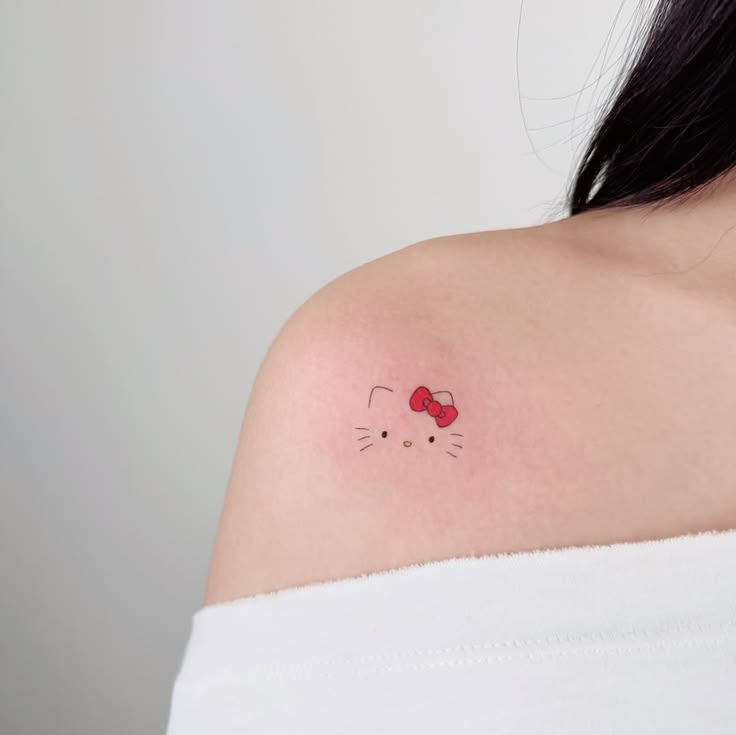 29 Hello Kitty Tattoo Ideas: Cute, Minimalist, Pink and Playful Designs