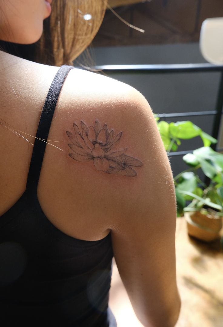 28 Water Lily Tattoo Ideas 2026: Beautiful Fine Line, Color and Japanese Designs