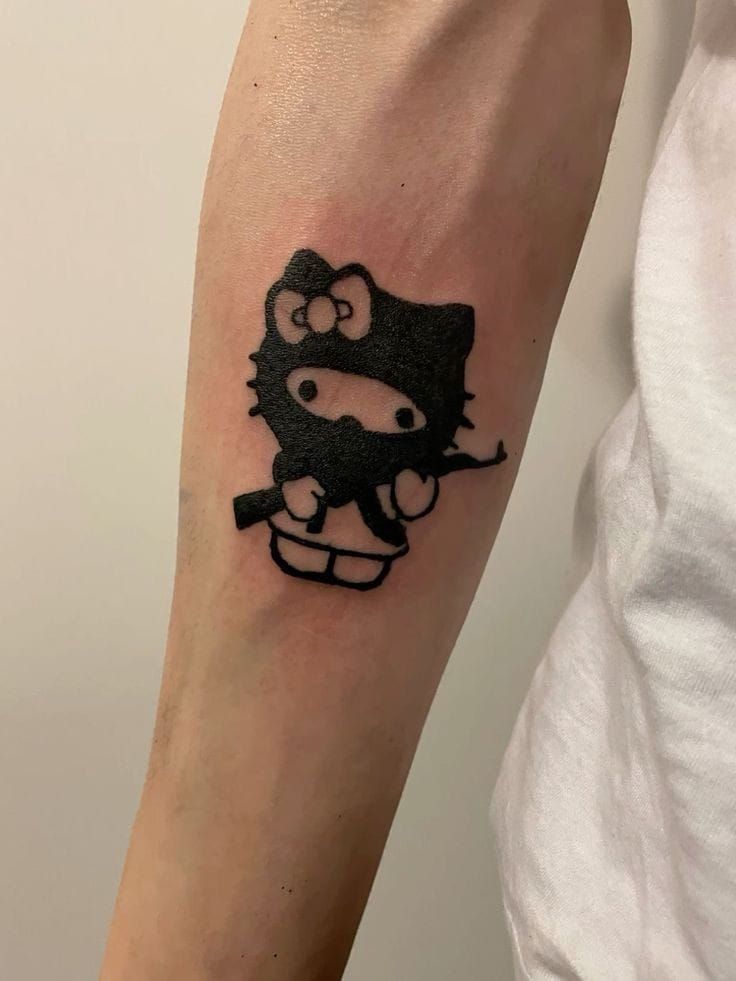 29 Hello Kitty Tattoo Ideas: Cute, Minimalist, Pink and Playful Designs